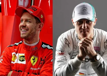 Sebastian Vettel con divisa Ferrari e Michael Schumacher con divisa Mercedes